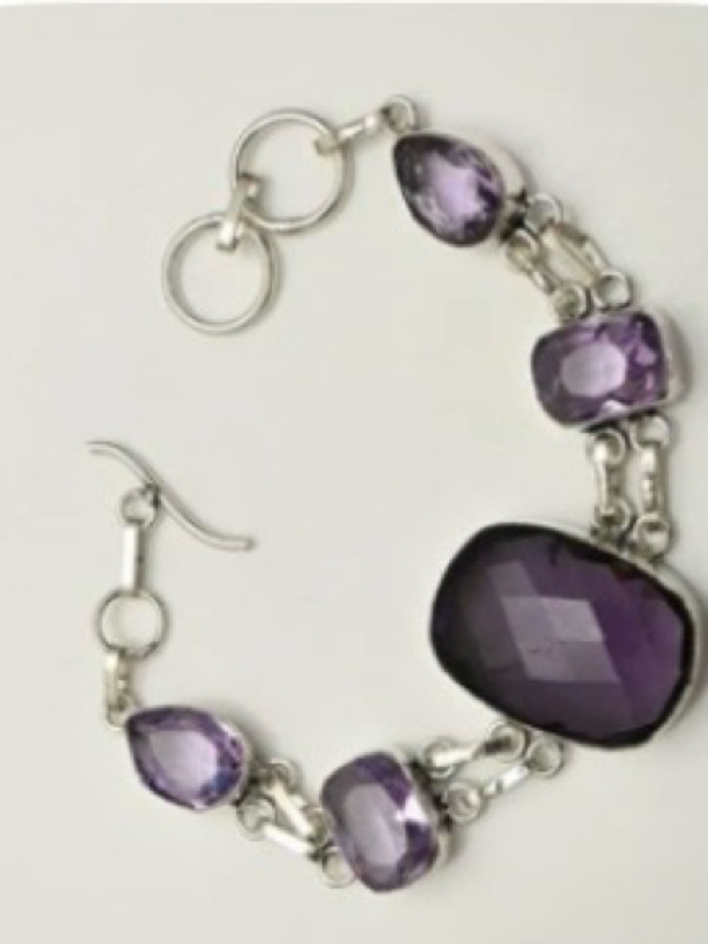 Beautiful, 5 stone, 925 marked, faceted, Purple Amethyst bracelet. Size 7-8